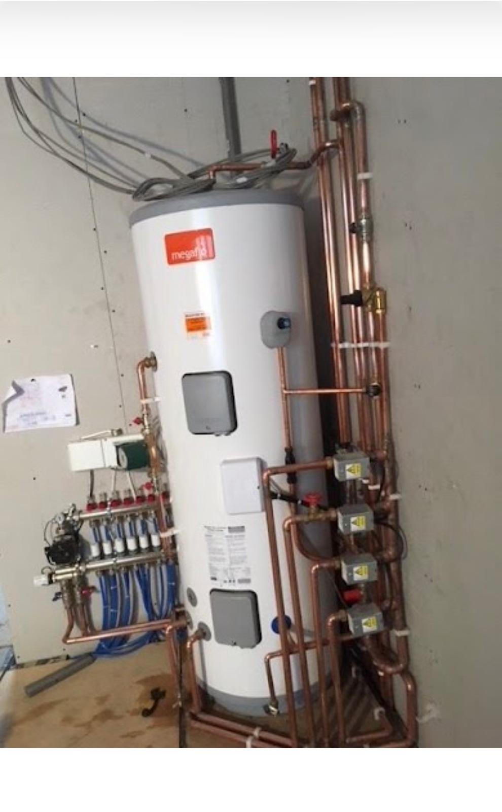 Completed hot-water cylinder and heating pipework